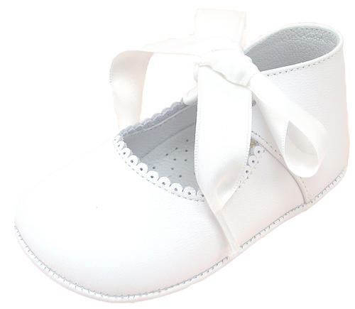 white pram shoes girl